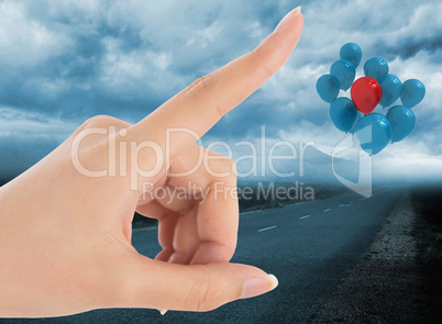 Composite image of female hand pointing
