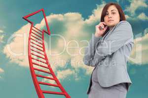 Composite image of focused businesswoman