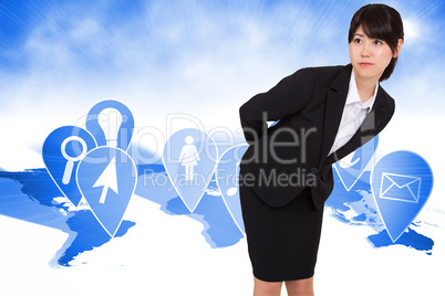 Composite image of serious businesswoman bending