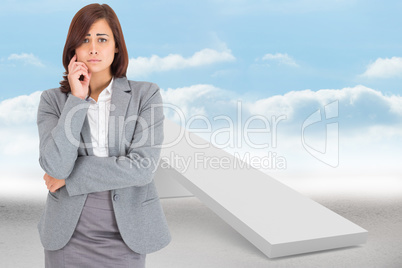 Composite image of upset thinking businesswoman