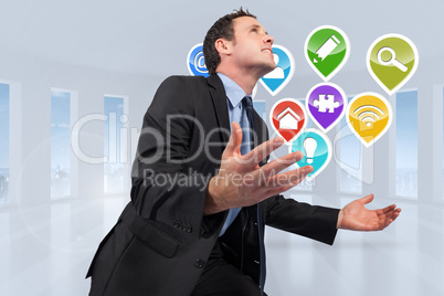 Composite image of businessman posing with arms out