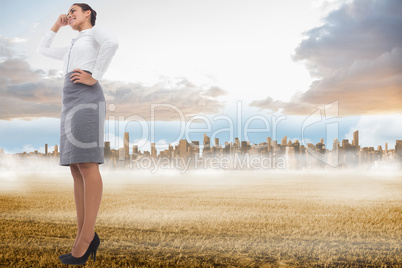 Composite image of happy businesswoman