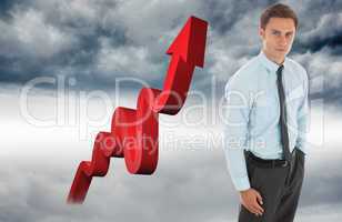 Composite image of serious businessman with hand in pocket