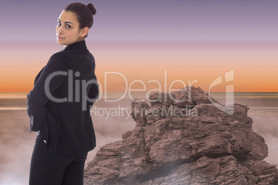 Composite image of serious businesswoman