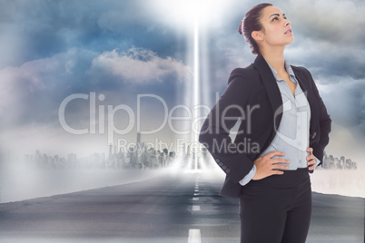 Composite image of serious businesswoman