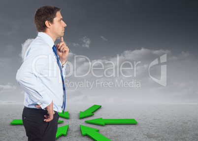 Composite image of thinking businessman touching his chin