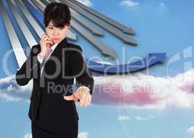 Composite image of thoughtful businesswoman pointing