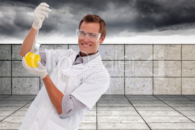 Composite image of young scientist working with a beaker