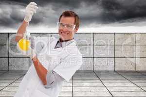 Composite image of young scientist working with a beaker