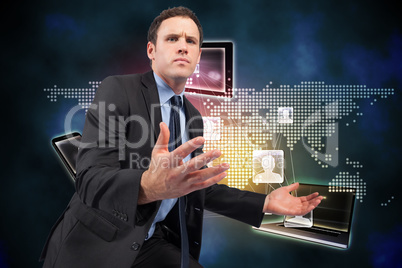 Composite image of businessman posing with arms out