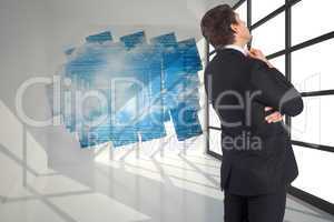 Composite image of thinking businessman