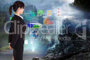 Composite image of businesswoman standing