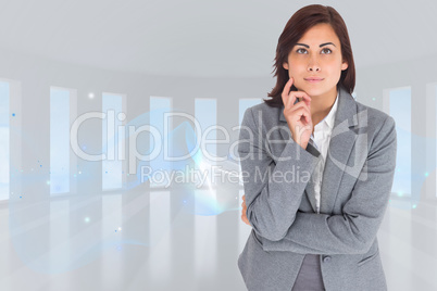 Composite image of smiling thoughtful businesswoman