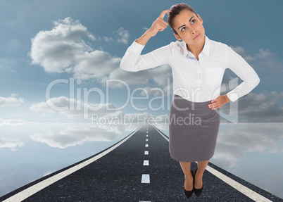 Composite image of focused businesswoman