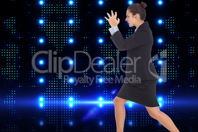 Composite image of angry businesswoman gesturing