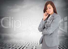 Composite image of worried businesswoman