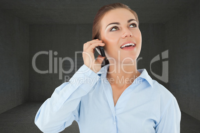 Composite image of smiling businesswoman looking upwards while o