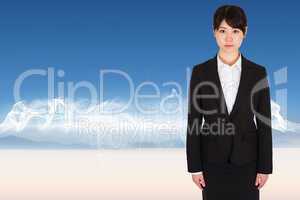 Composite image of serious businesswoman