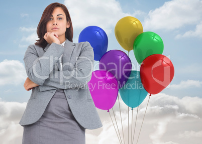 Composite image of focused businesswoman