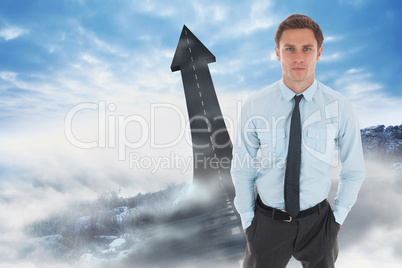 Composite image of serious businessman with hands in pockets