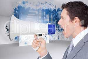 Composite image of businessman using a megaphone