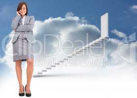 Composite image of smiling thoughtful businesswoman