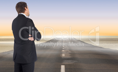 Composite image of thinking businessman