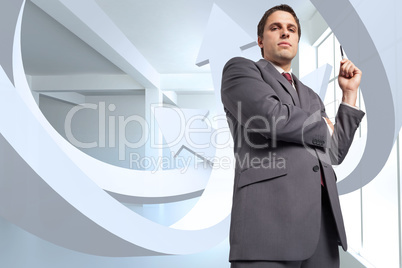 Composite image of thoughtful businessman holding pen