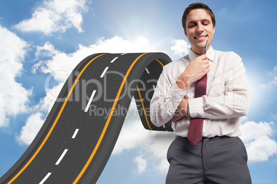 Composite image of thoughtful businessman holding pen to chin