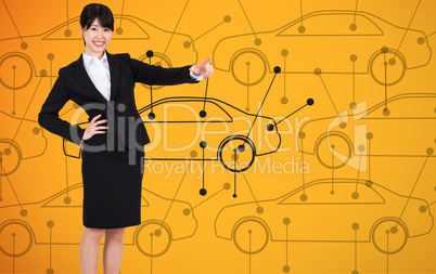 Composite image of smiling businesswoman pointing