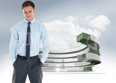 Composite image of smiling businessman standing with hand in poc