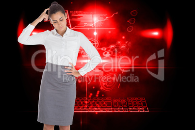 Composite image of focused businesswoman