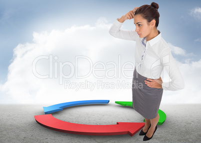 Composite image of focused businesswoman