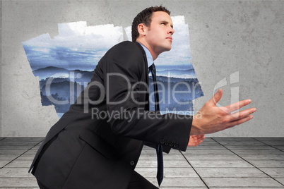 Composite image of businessman posing with arms out