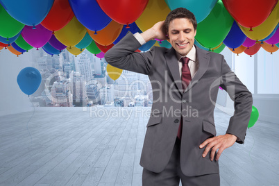 Composite image of thinking businessman scratching head