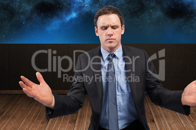 Composite image of businessman posing with arms out