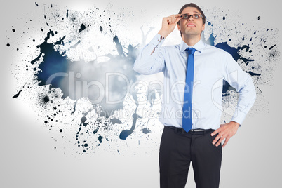 Composite image of thinking businessman tilting glasses