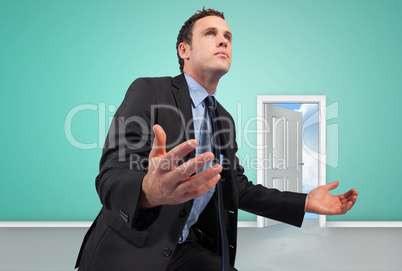 Composite image of businessman posing with arms out