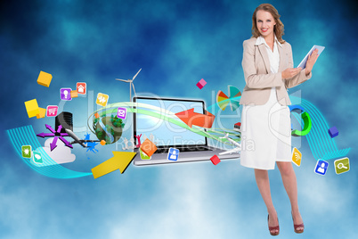 Composite image of happy pretty businesswoman holding a tablet p