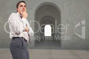 Composite image of thoughtful businessman with hand on chin