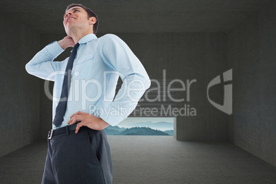 Composite image of thinking businessman with hand on head