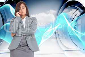 Composite image of worried businesswoman