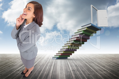 Composite image of smiling thoughtful businesswoman