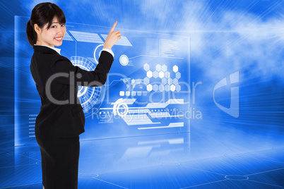 Composite image of smiling businesswoman pointing