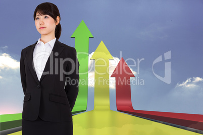 Composite image of serious businesswoman