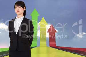 Composite image of serious businesswoman