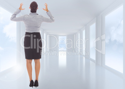 Composite image of frustrated businesswoman shouting