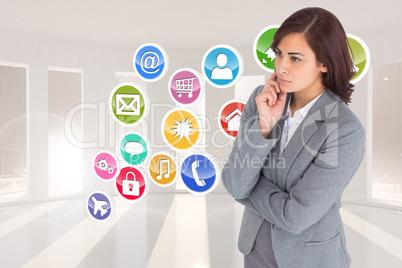 Composite image of focused businesswoman