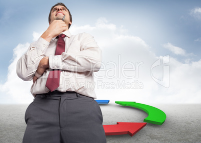 Composite image of thoughtful businessman holding pen to chin