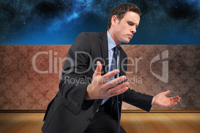 Composite image of businessman posing with arms out